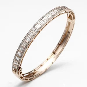 Baguette diamonds elevate this sleek bangle