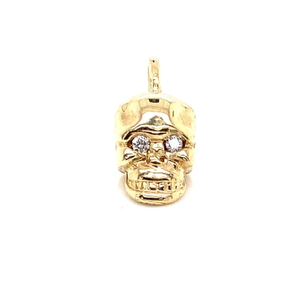 solid gold skull charm with diamond eyes